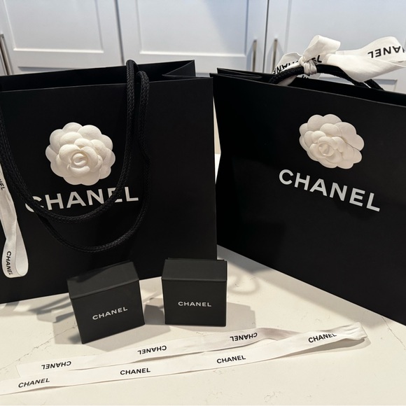 CHANEL Handbags - 2 Chanel shopping bags with camellia flower and  ribbons, 2 small jewelry boxes.
